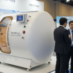 Three people analyzing the price of hyperbaric oxygen chambers